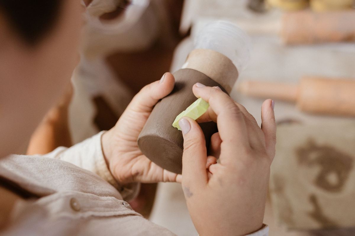 Carving detail into a bisque piece